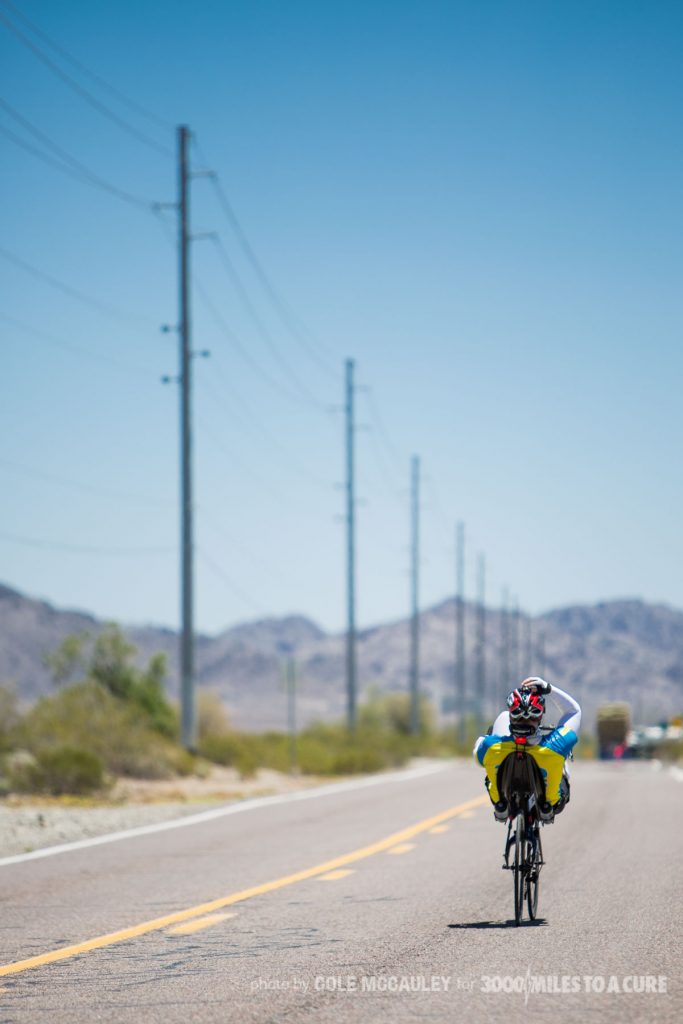 Rob pedals on through the Sonoran desert in 100 degree heat.
